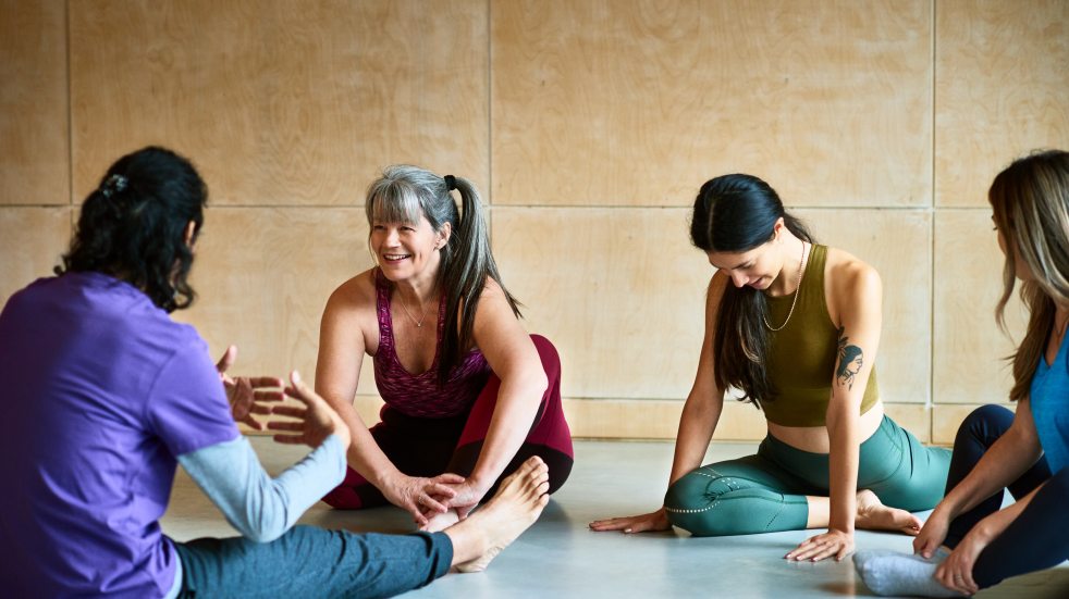 group of people doing yoga